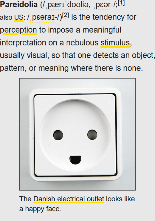 The Danish electrical outlet with pareidolia definition above